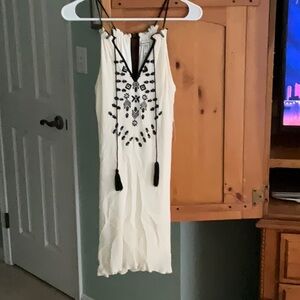 Crème and black dress